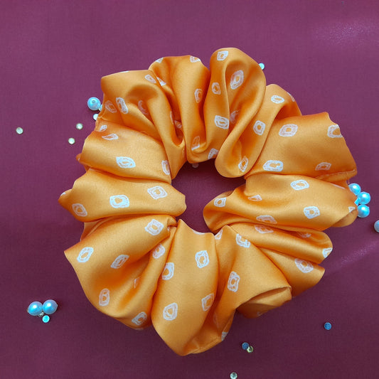 Orange Bandhni satin scrunchie